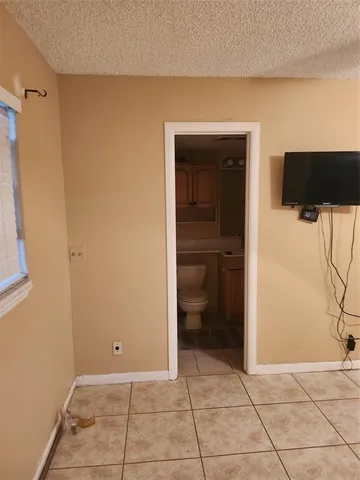 a bathroom with a tub and a shower