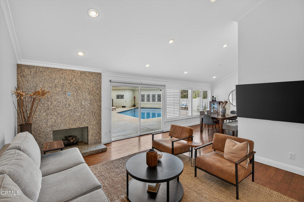 9325 La Shell Drive Tujunga, CA 91042 - Photo 9 of 46 a living room with furniture and a flat screen tv