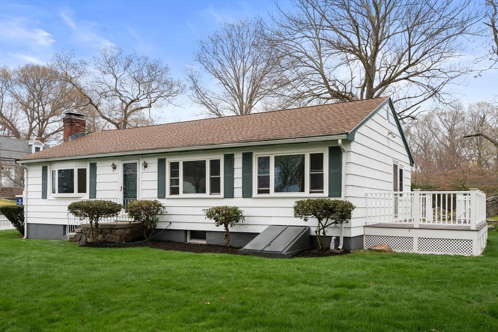 125 Lyman Road Milton, MA 02186 - Photo 1 of 25 a front view of house with yard patio and green space