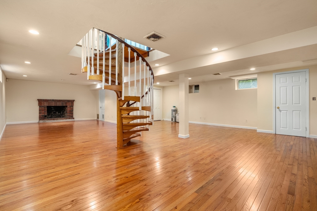 125 Lyman Road Milton, MA 02186 - Photo 17 of 25 a view of empty room with wooden floor