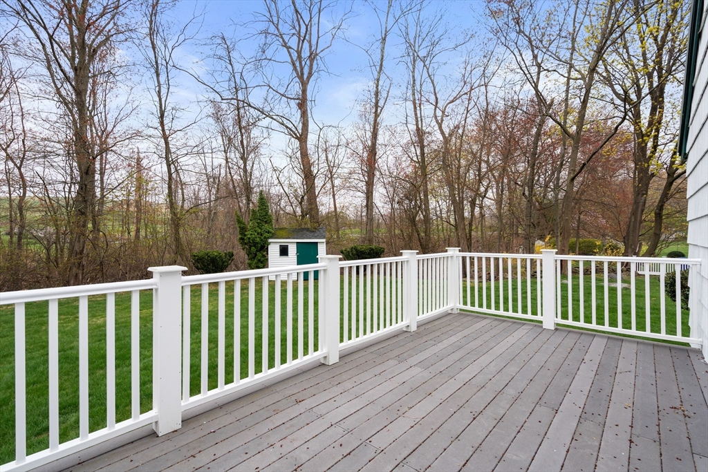 125 Lyman Road Milton, MA 02186 - Photo 20 of 25 a view of a wooden roof deck