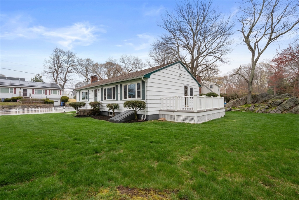 125 Lyman Road Milton, MA 02186 - Photo 2 of 25 a view of a house with a backyard