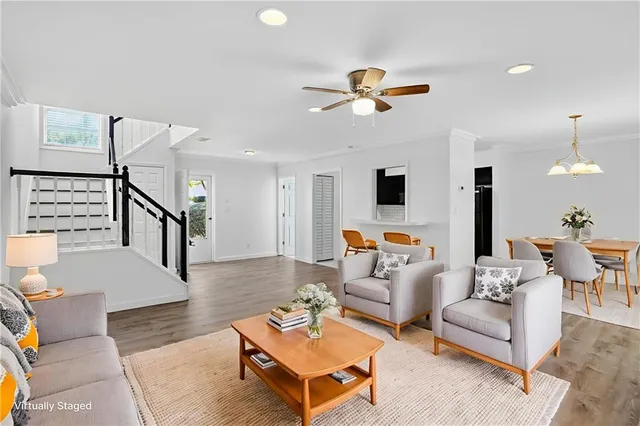 a living room with furniture and a table