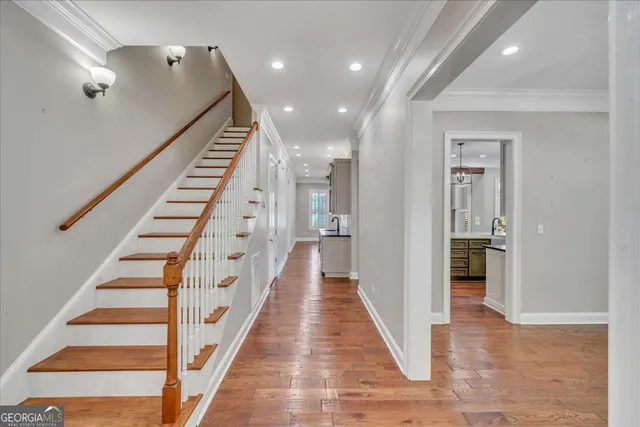a view of a hallway with stairs
