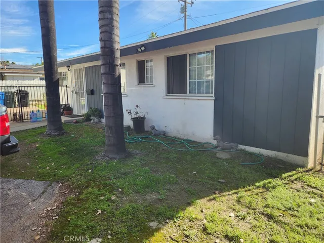a backyard of a house with seating space