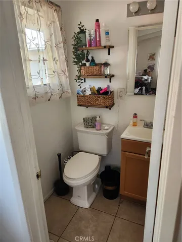 a bathroom with a toilet and a sink