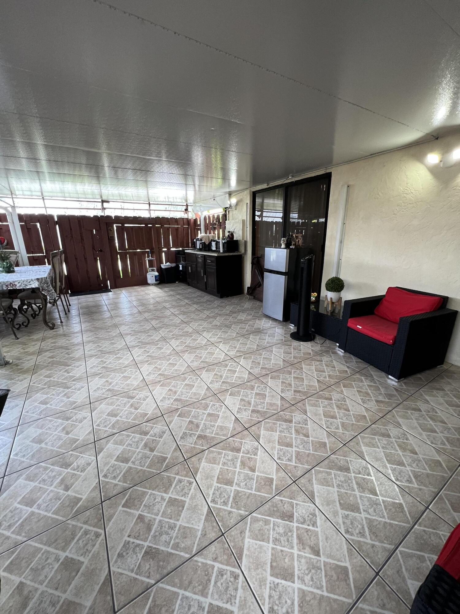 411 Arabian Road Palm Springs, FL 33461 - Photo 27 of 29 Covered Patio