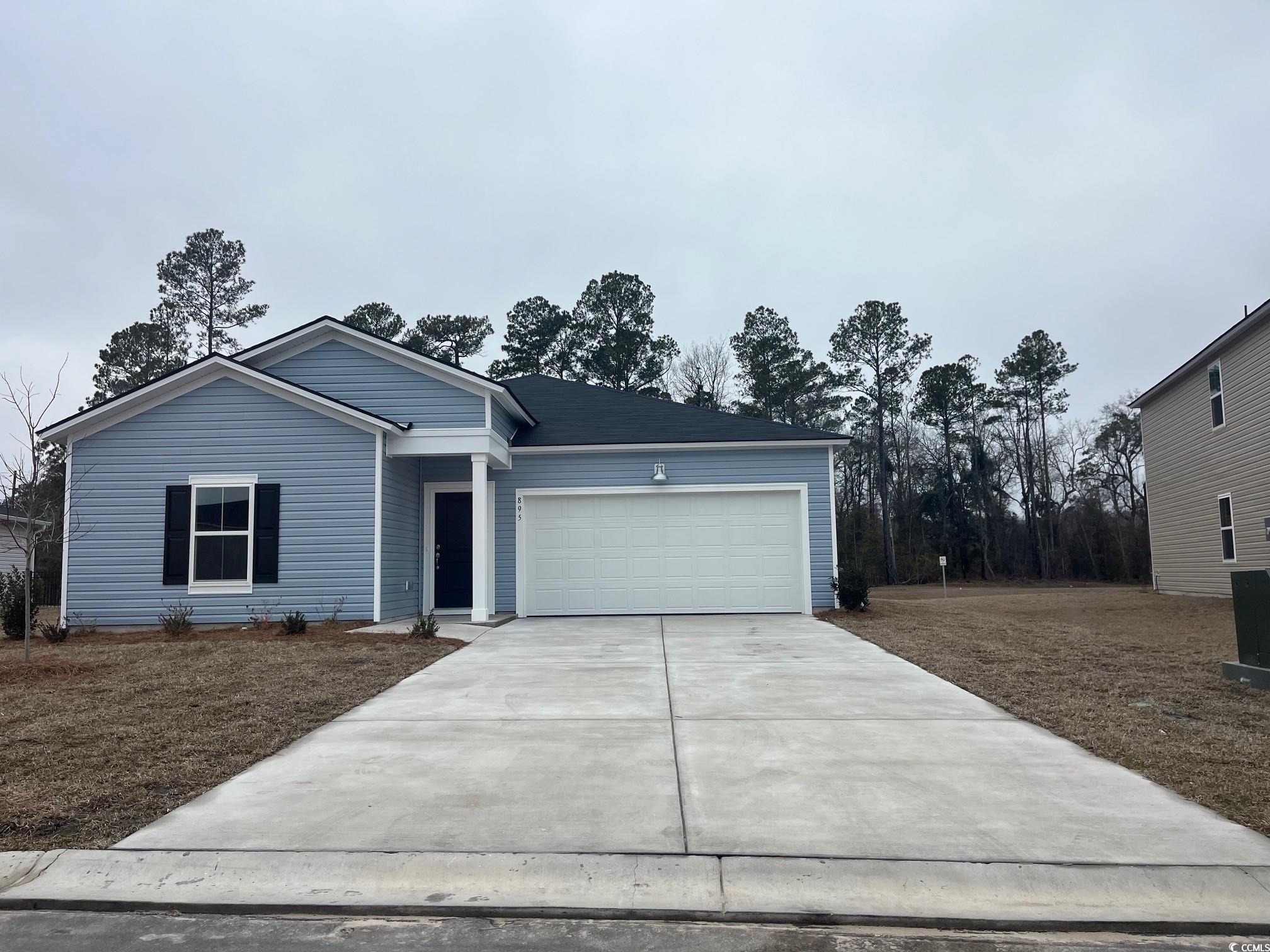 895 Long Bch Loop Longs, SC 29568 - Photo 1 of 26 Single story home featuring driveway and an attach