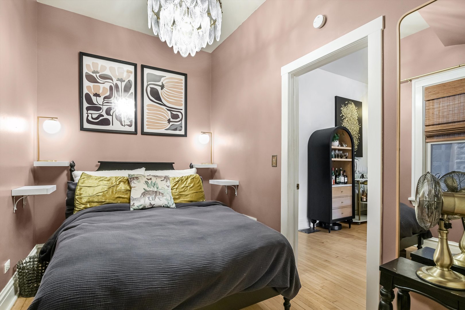 1413 North Campbell Avenue, Unit 1 Chicago, IL 60622 - Photo 11 of 20 a bedroom with a bed and wooden floor