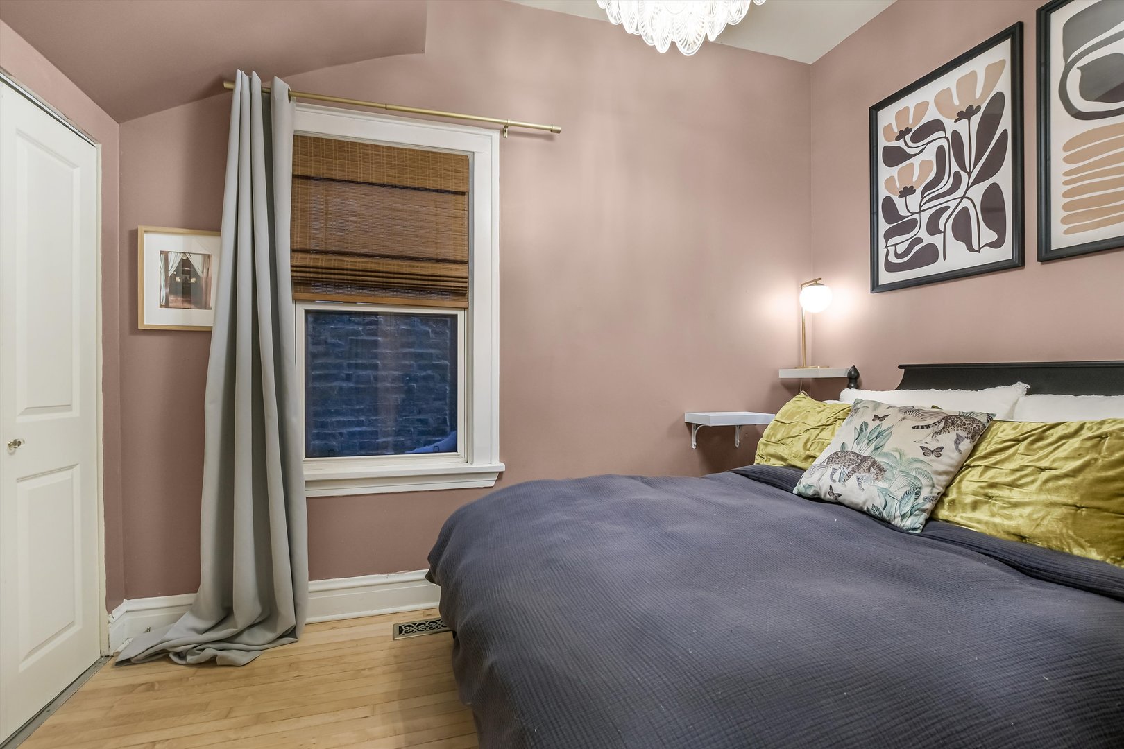 1413 North Campbell Avenue, Unit 1 Chicago, IL 60622 - Photo 12 of 20 a bedroom with a bed and a window