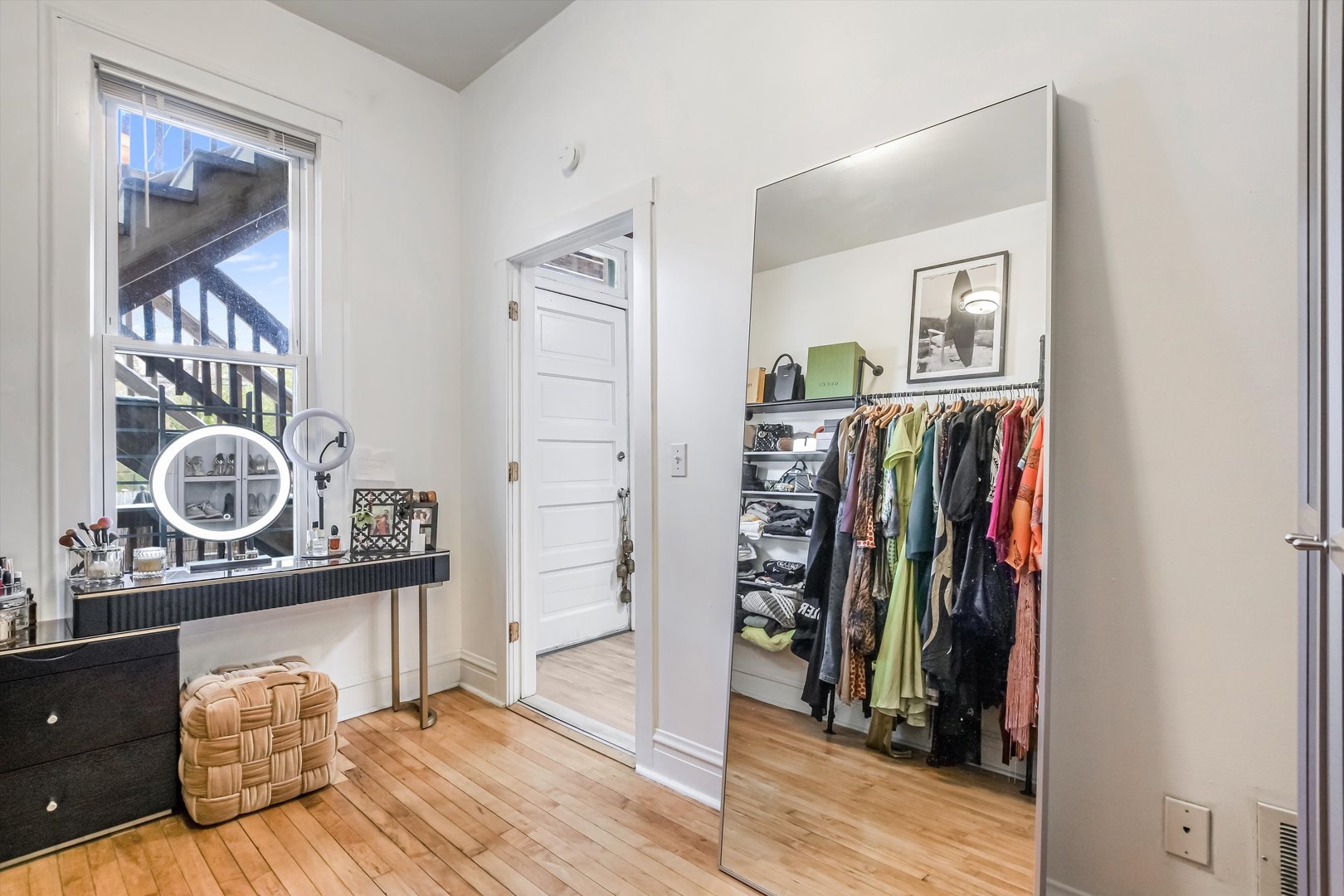 1413 North Campbell Avenue, Unit 1 Chicago, IL 60622 - Photo 18 of 20 a view of walk in closet with clothes and shoes