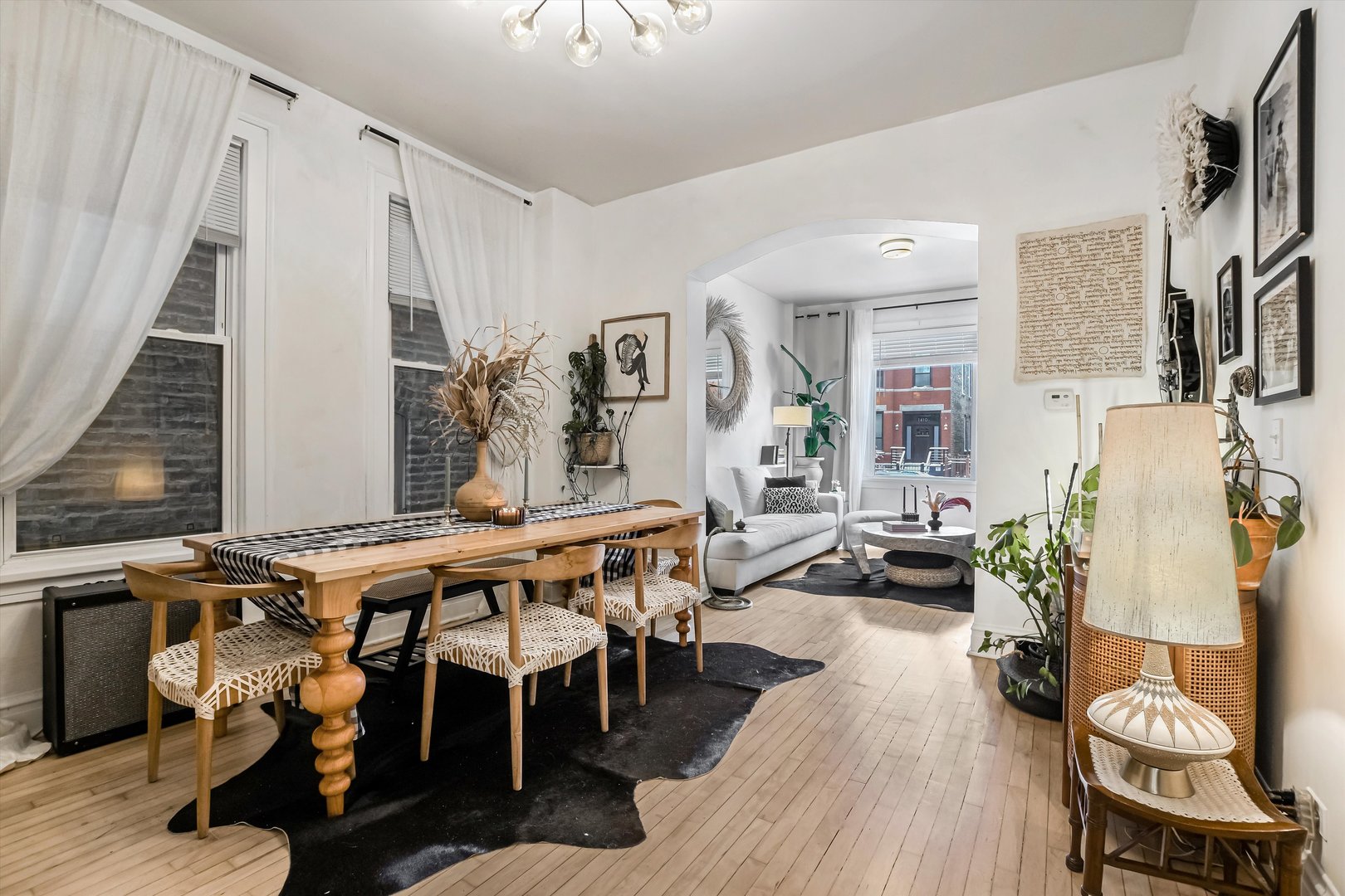 1413 North Campbell Avenue, Unit 1 Chicago, IL 60622 - Photo 5 of 20 a view of a dining room with furniture and wooden floor