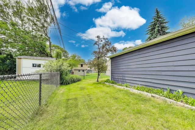 a view of a backyard with a garden