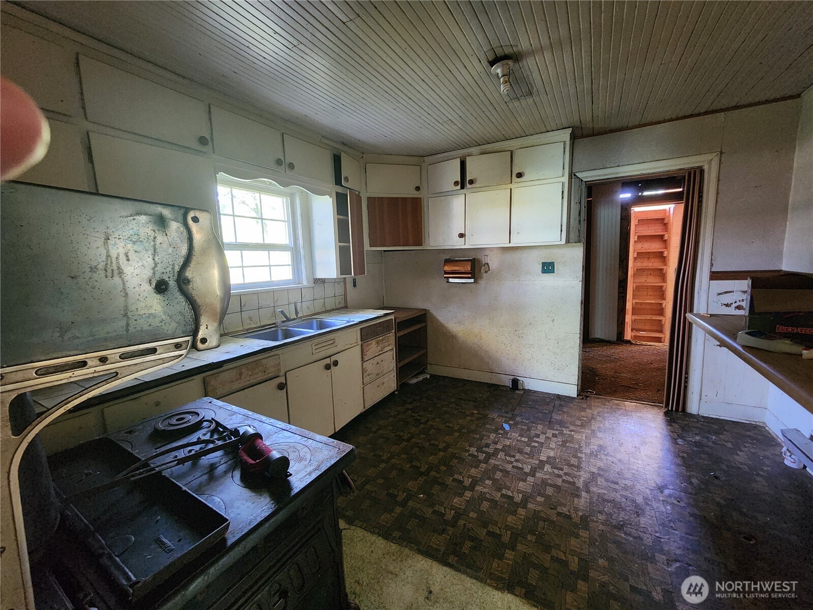 175 Stevens Road Chehalis, WA 98532 - Photo 13 of 20 a kitchen with sink cabinets and stove
