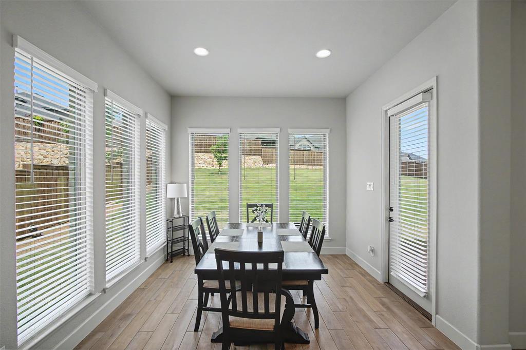 116 Derrett Lane Rhome, TX 76078 - Photo 8 of 30 a view of a dining room with furniture and window