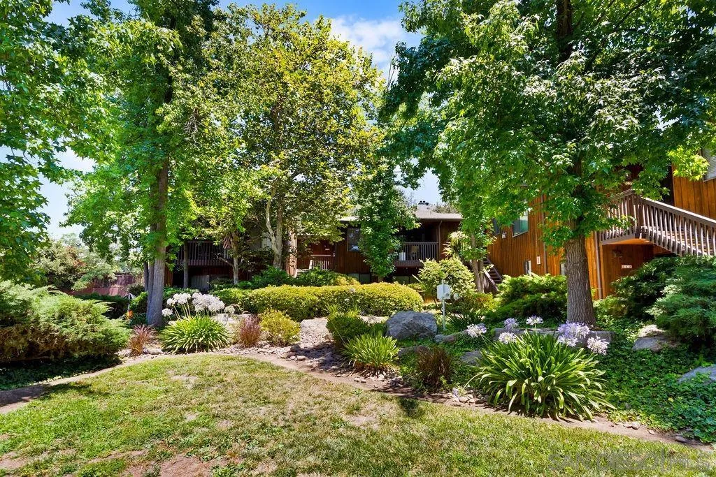 2157 Arnold Way, Unit 324 Alpine, CA 91901 - Photo 29 of 31 a backyard of a house with a yard and outdoor seating