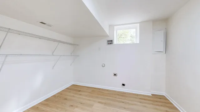 a view of a yard with a tree