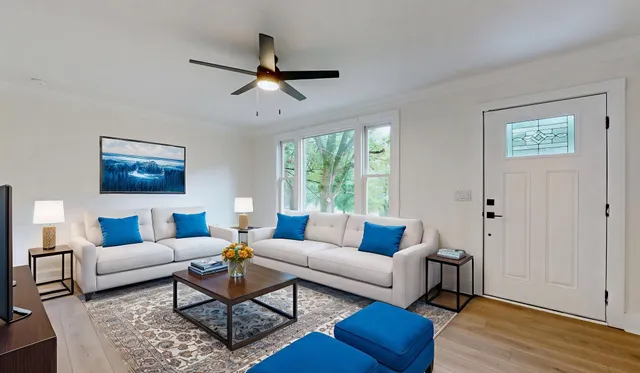 a living room with furniture and a window