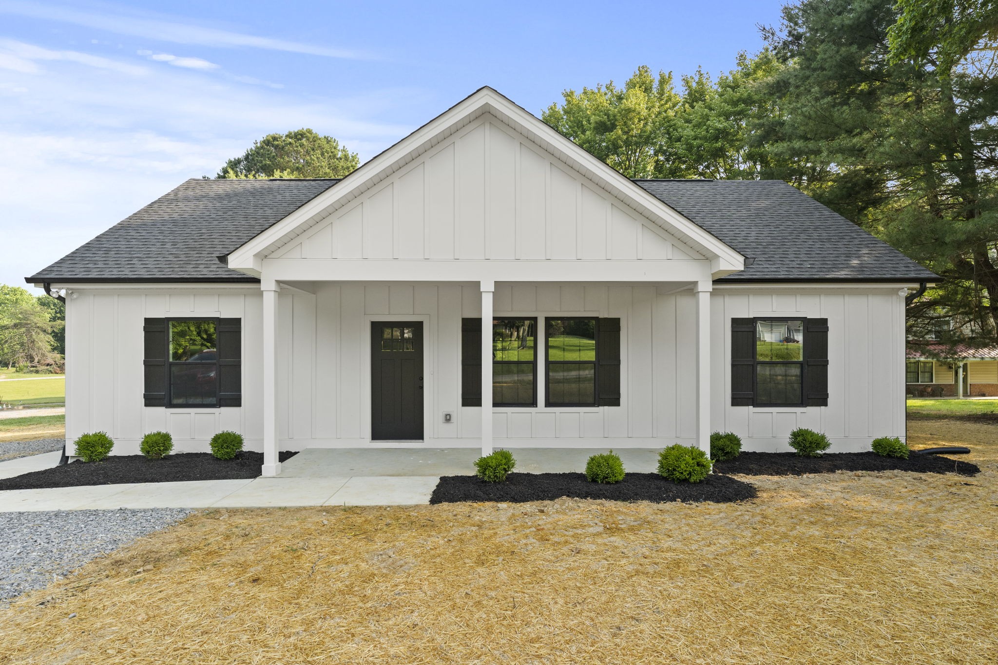 204 Point Road Portland, TN 37148 - Photo 1 of 51 a front view of a house with a yard