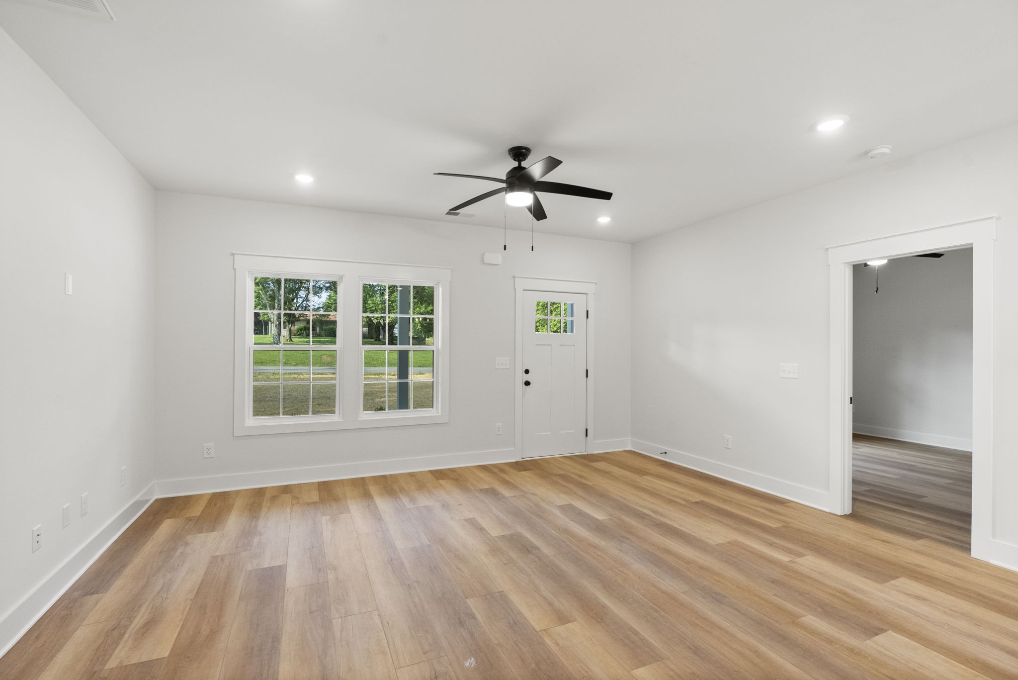 204 Point Road Portland, TN 37148 - Photo 9 of 51 wooden floor in an empty room with a window