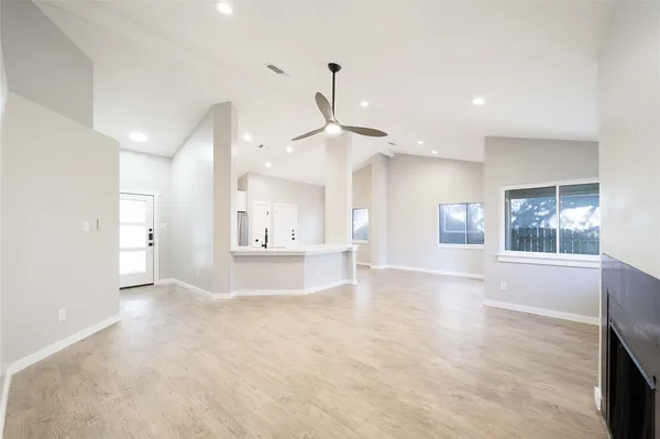 a view of an empty room and window