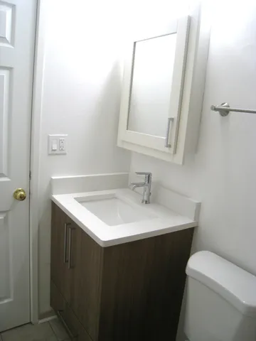 a bathroom with a bathtub and toilet