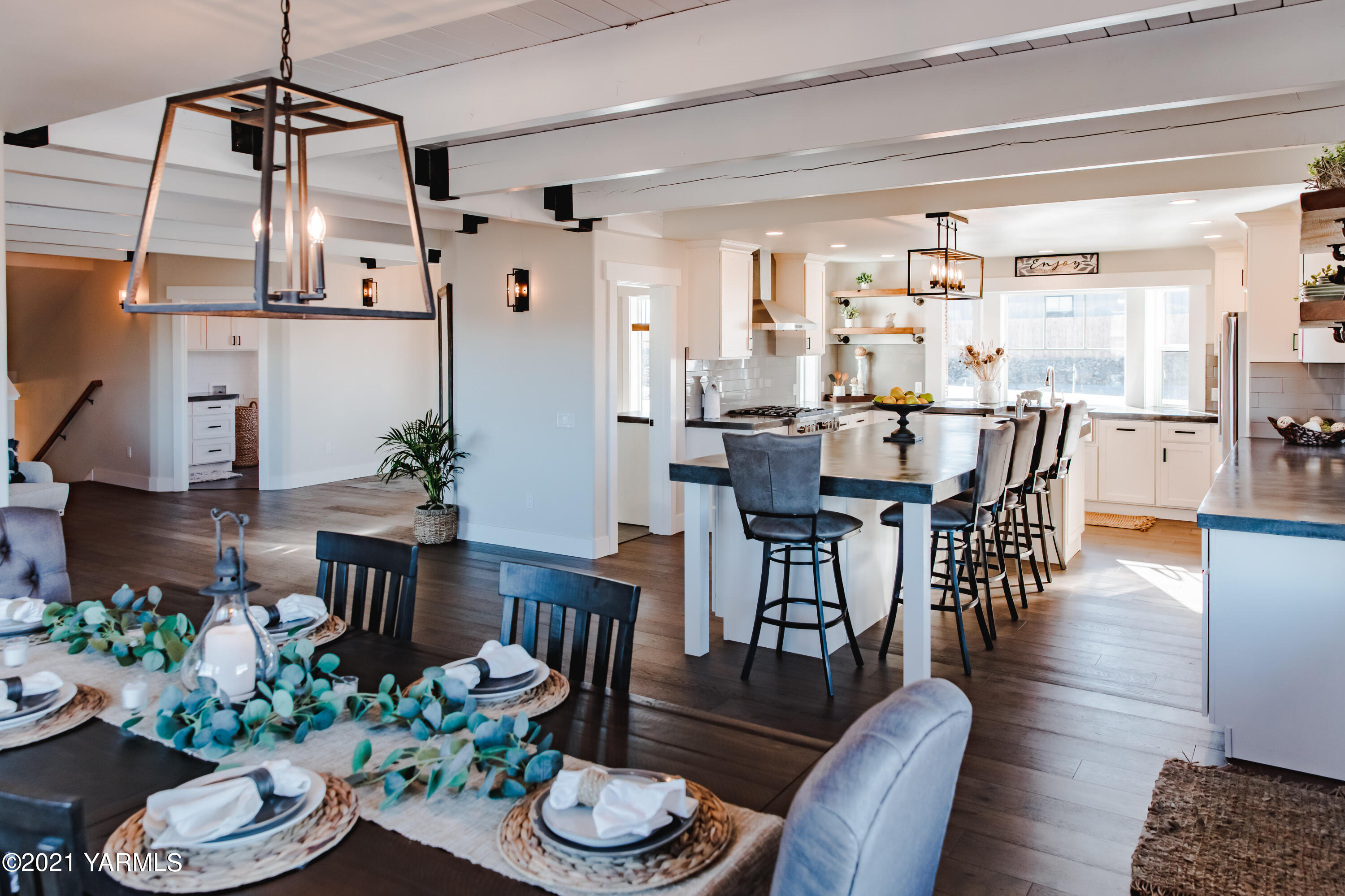491 Elliott Road Cowiche, WA 98923 - Photo 12 of 49 a view of a dining room with furniture and wooden floor