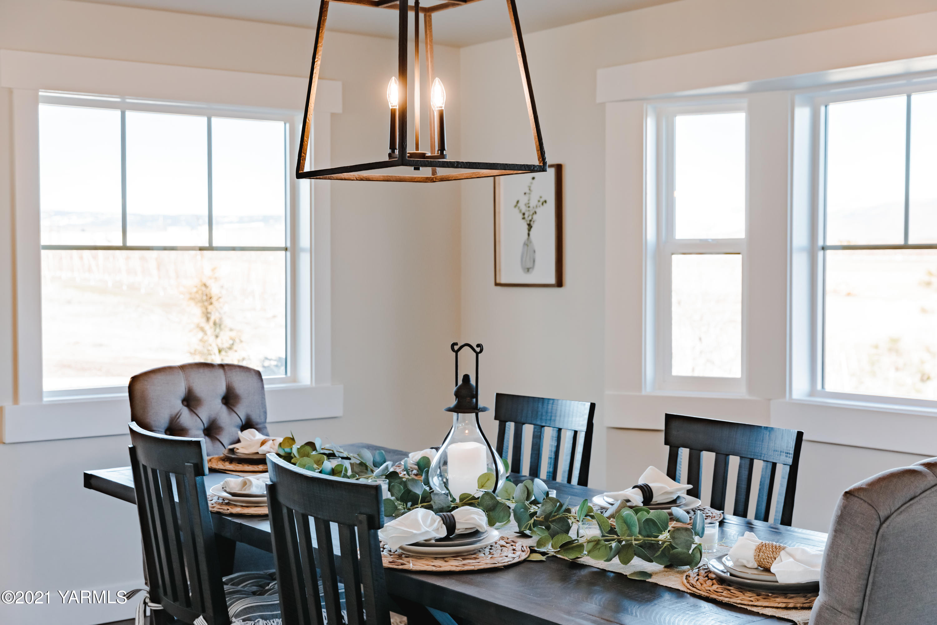 491 Elliott Road Cowiche, WA 98923 - Photo 13 of 49 a view of a dining room with furniture window and wooden floor