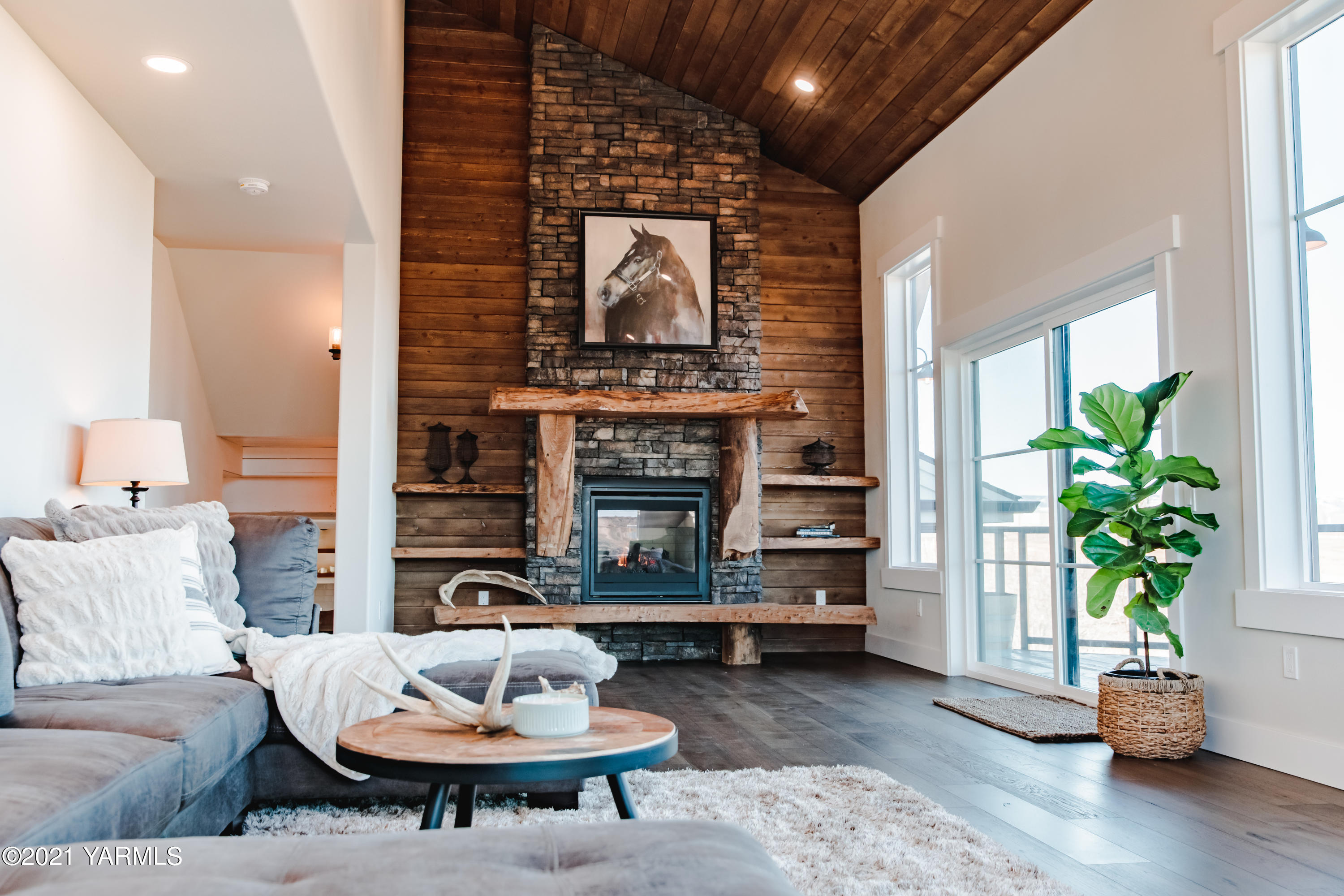 491 Elliott Road Cowiche, WA 98923 - Photo 16 of 49 a living room with furniture and a fireplace