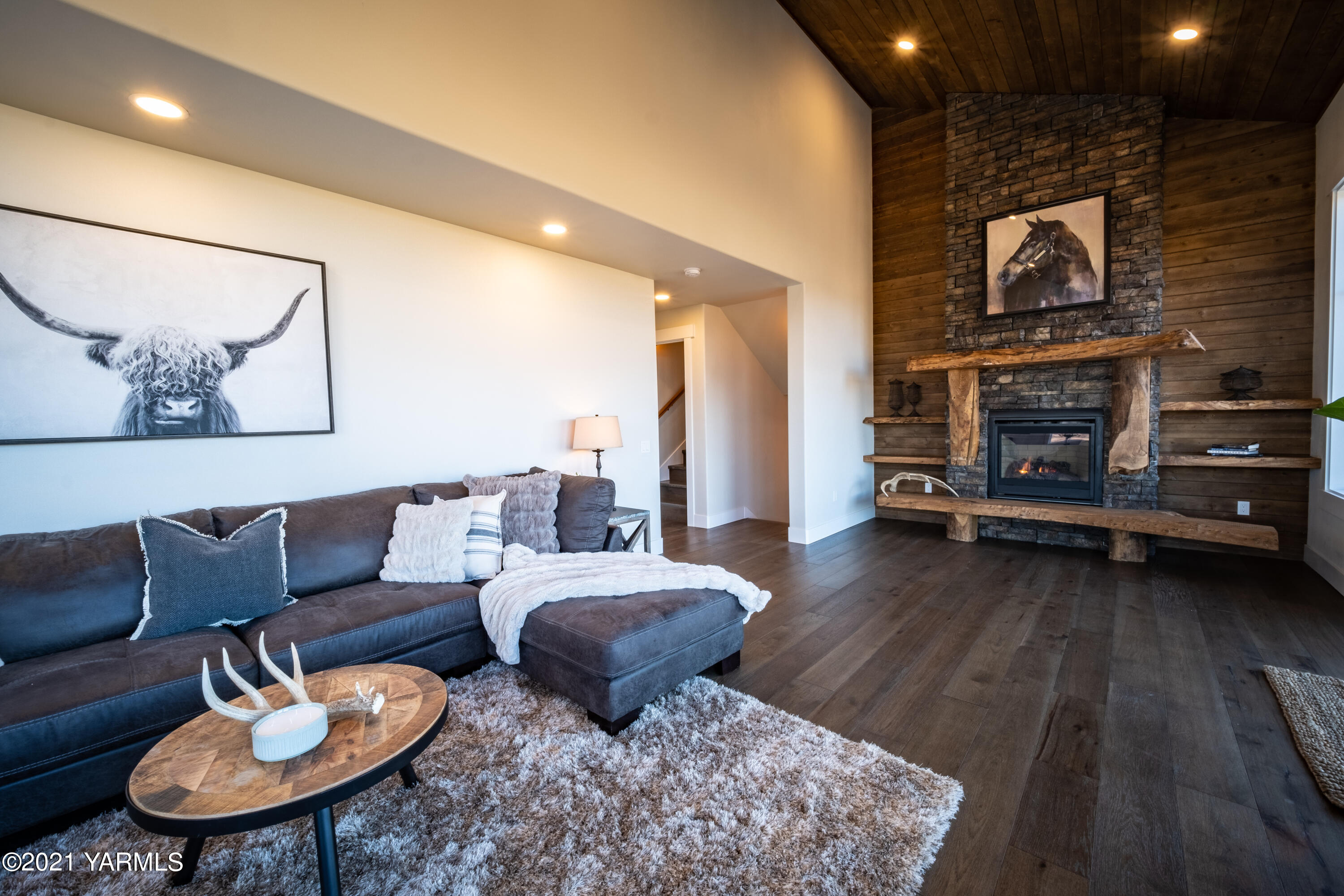 491 Elliott Road Cowiche, WA 98923 - Photo 17 of 49 a living room with furniture and a fireplace