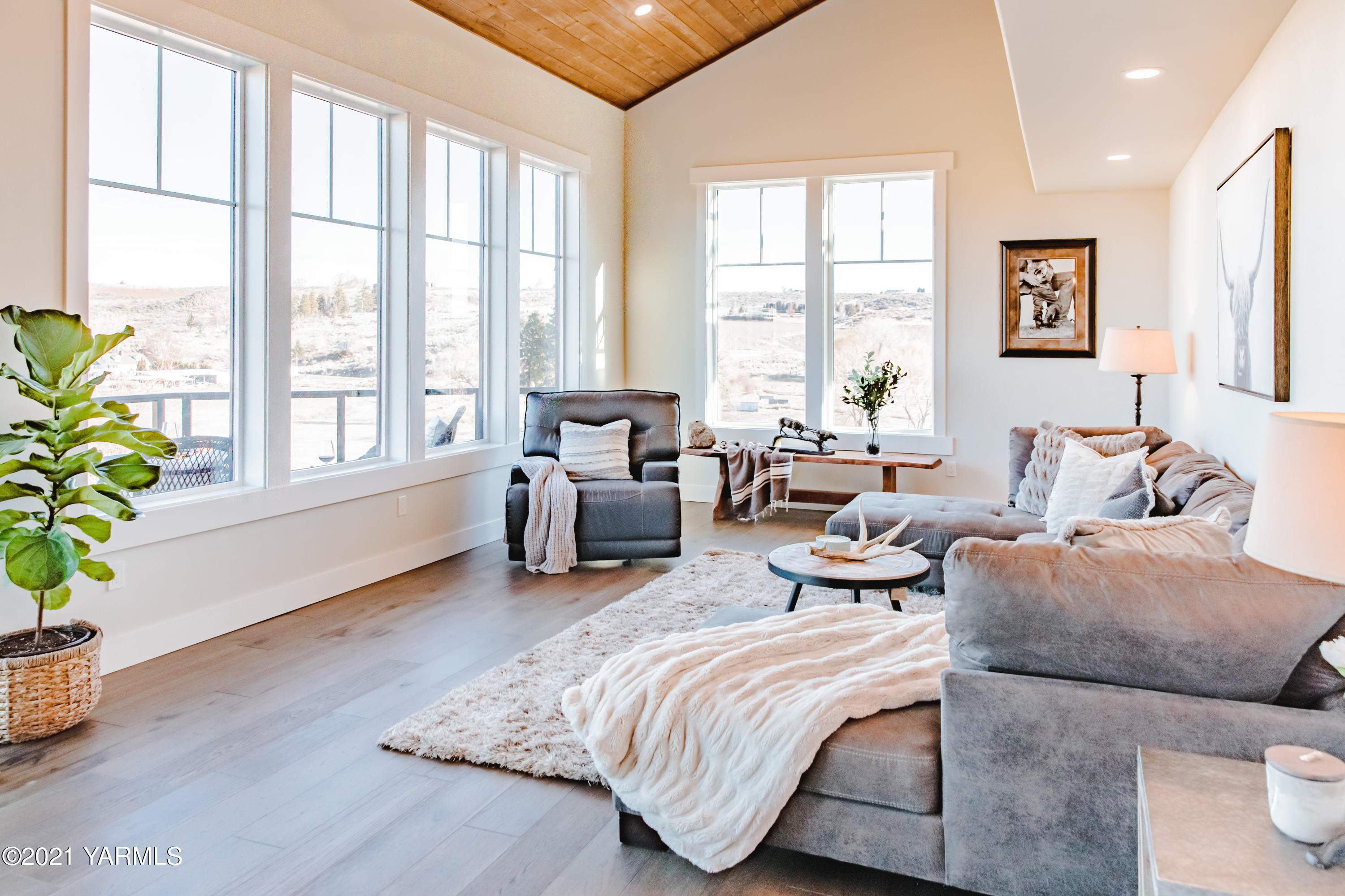 491 Elliott Road Cowiche, WA 98923 - Photo 19 of 49 a bedroom with furniture and a large window