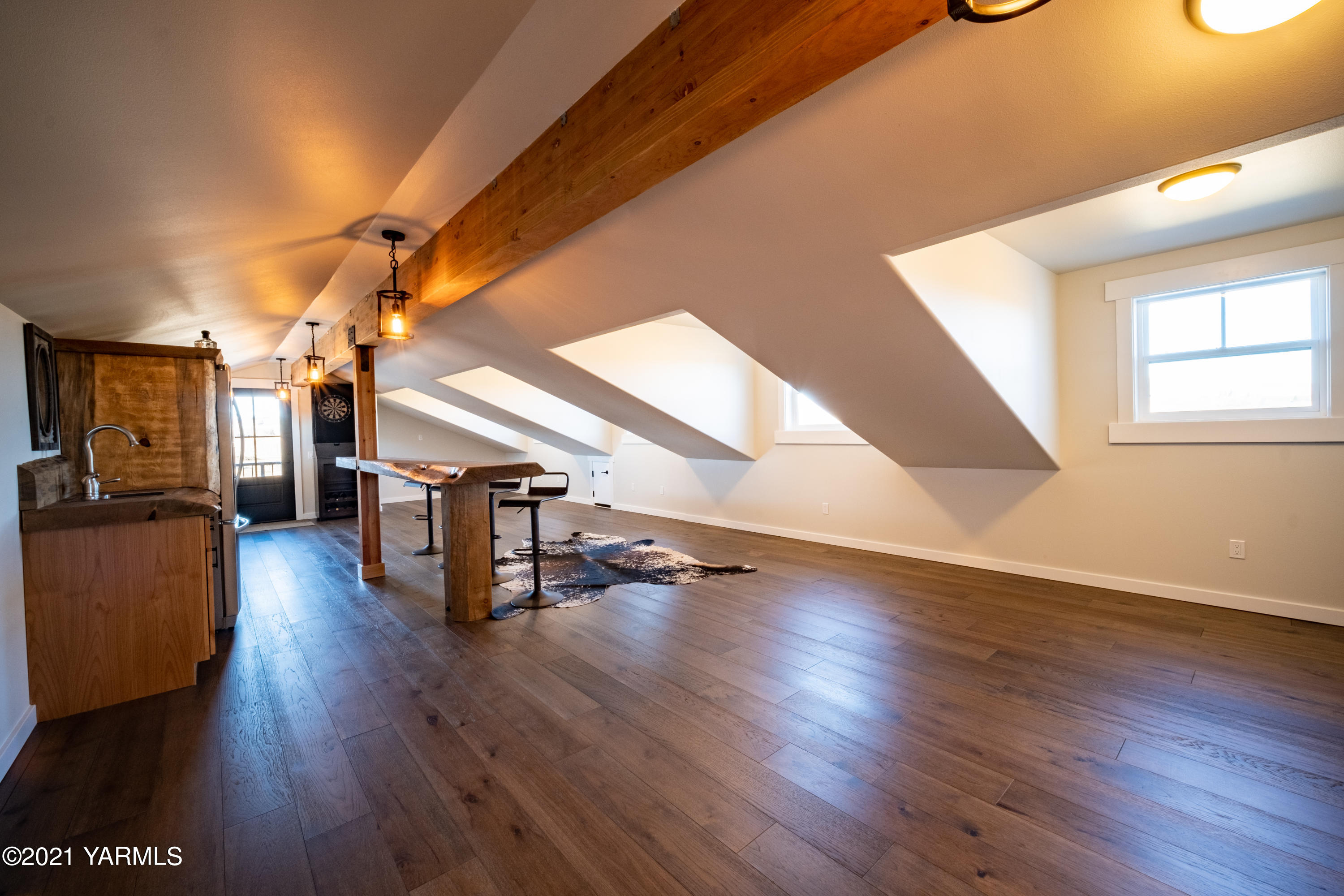 491 Elliott Road Cowiche, WA 98923 - Photo 23 of 49 a view of a room with wooden floors and stairs