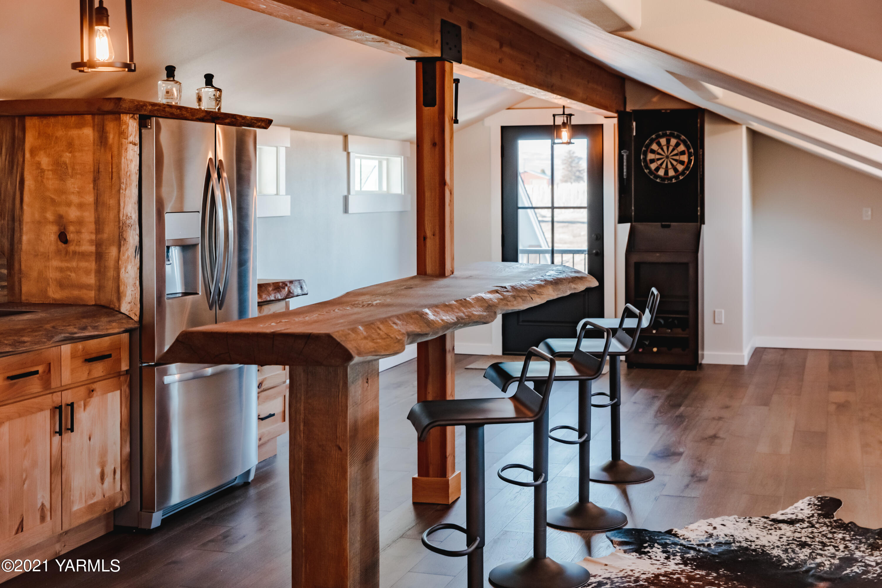 491 Elliott Road Cowiche, WA 98923 - Photo 24 of 49 a view of a dining room with furniture and wooden floor
