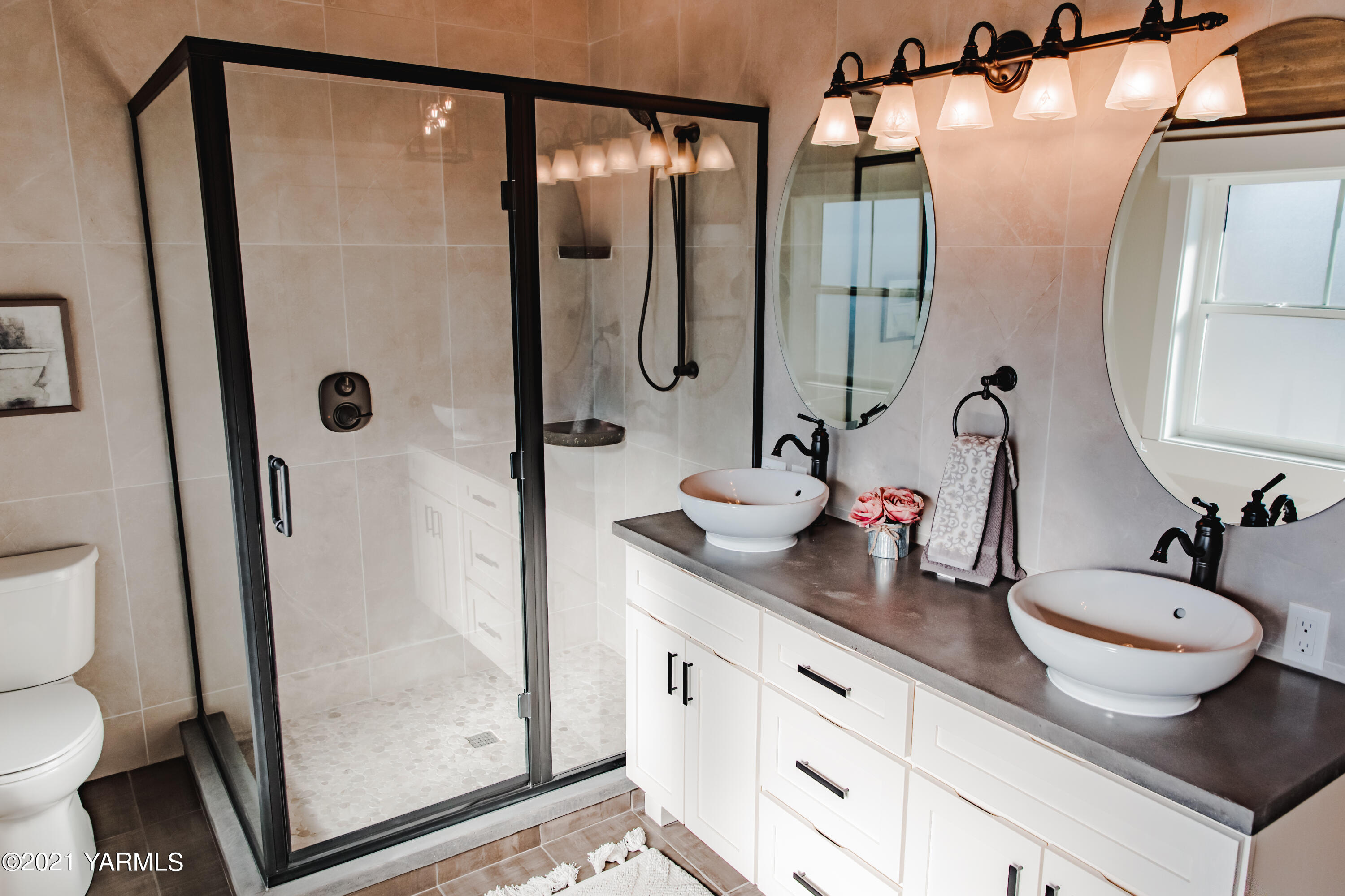 491 Elliott Road Cowiche, WA 98923 - Photo 28 of 49 a bathroom with a granite countertop sink a toilet and shower