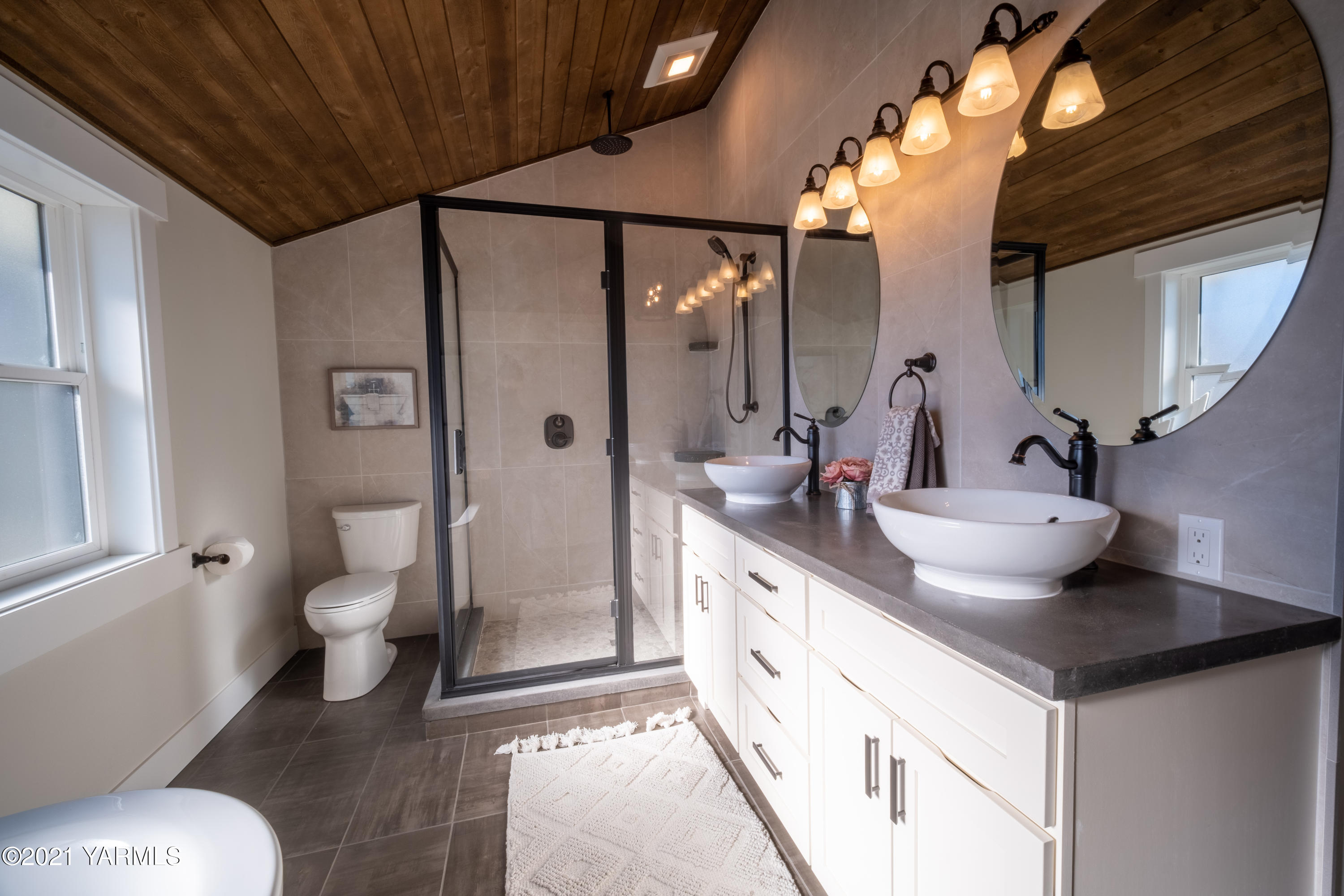 491 Elliott Road Cowiche, WA 98923 - Photo 30 of 49 a bathroom with a granite countertop sink toilet and shower