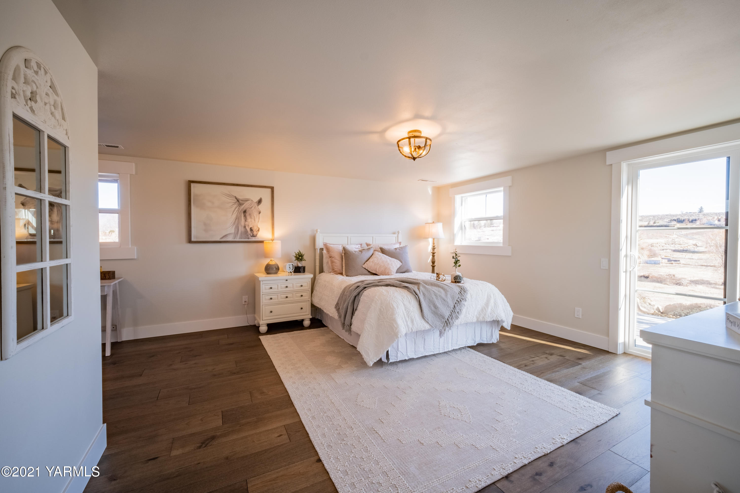 491 Elliott Road Cowiche, WA 98923 - Photo 36 of 49 a bedroom with a bed and a window