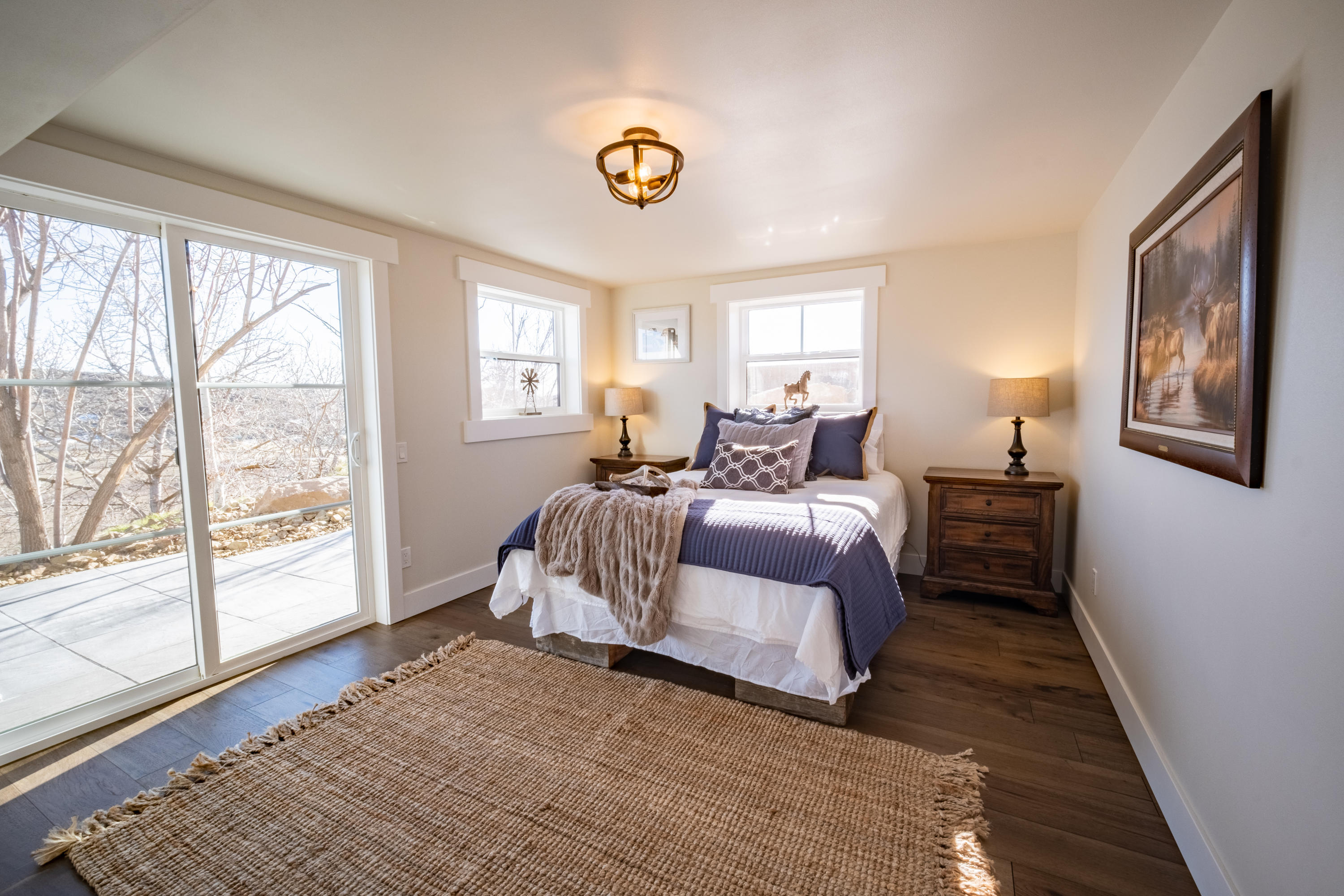 491 Elliott Road Cowiche, WA 98923 - Photo 39 of 49 a bedroom with a bed and a large window with balcony view