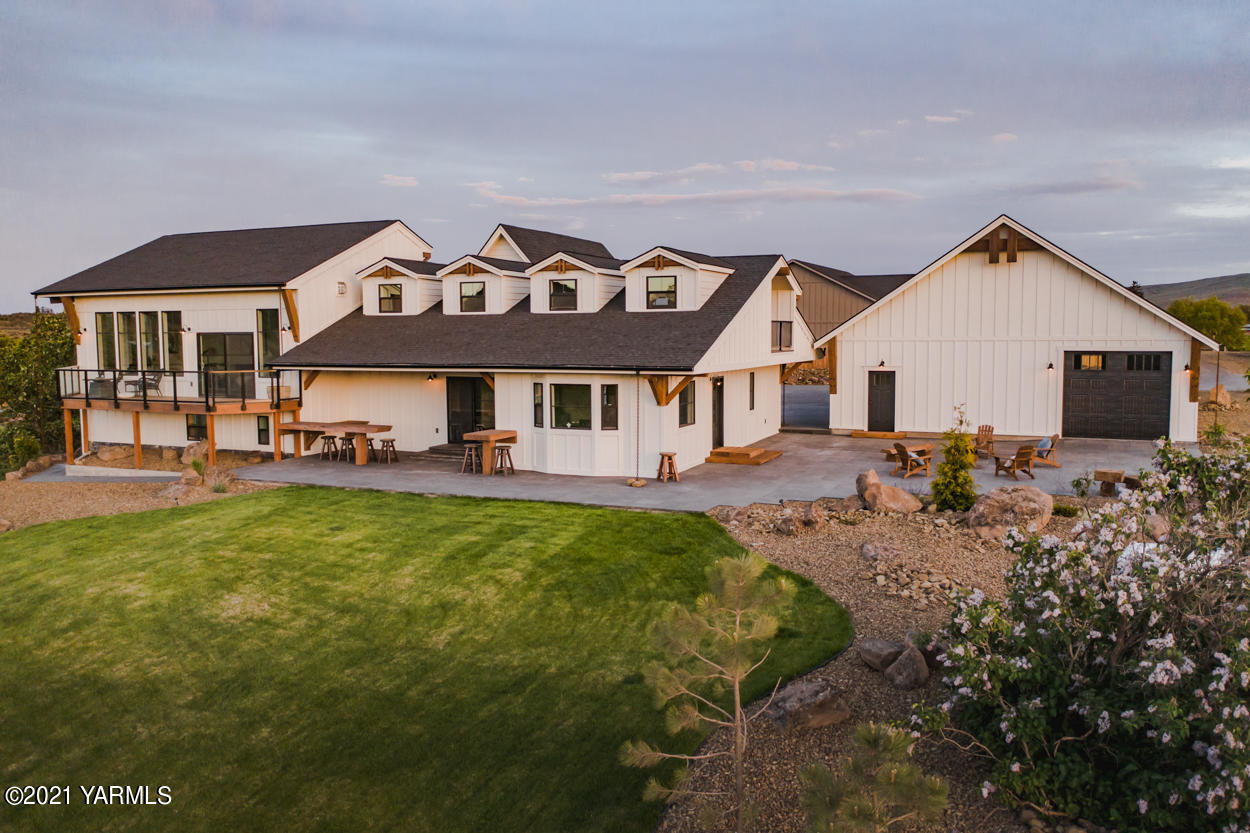 491 Elliott Road Cowiche, WA 98923 - Photo 47 of 49 a front view of a house with garden