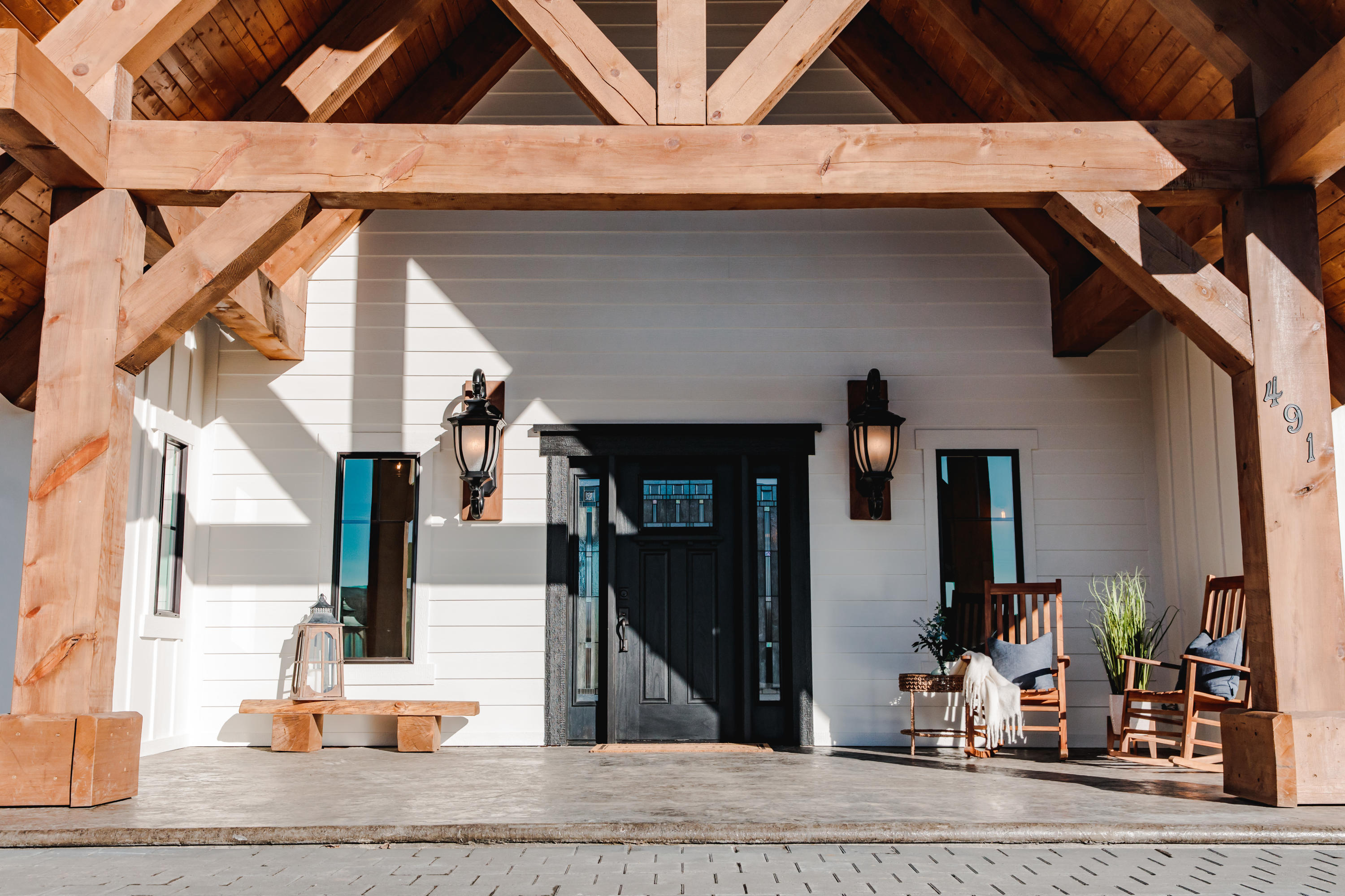 491 Elliott Road Cowiche, WA 98923 - Photo 6 of 49 a front view of a house with many windows