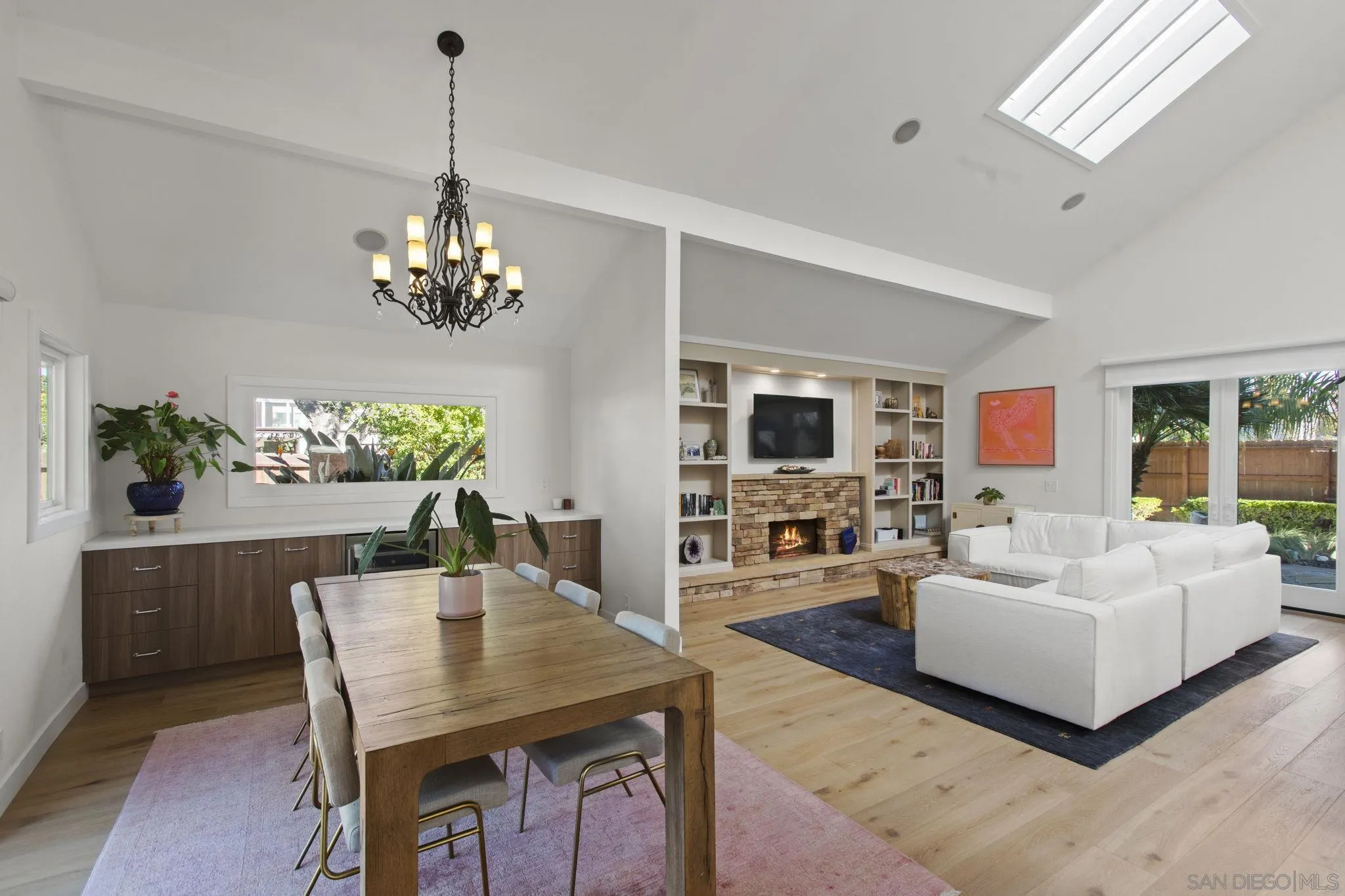 3942 Avenida Brisa Rancho Santa Fe, CA 92091 - Photo 11 of 47 a view of a dining room with furniture a livingroom and chandelier