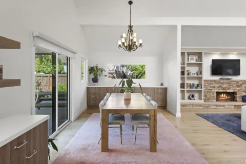 a view of a livingroom with furniture window and wooden floor