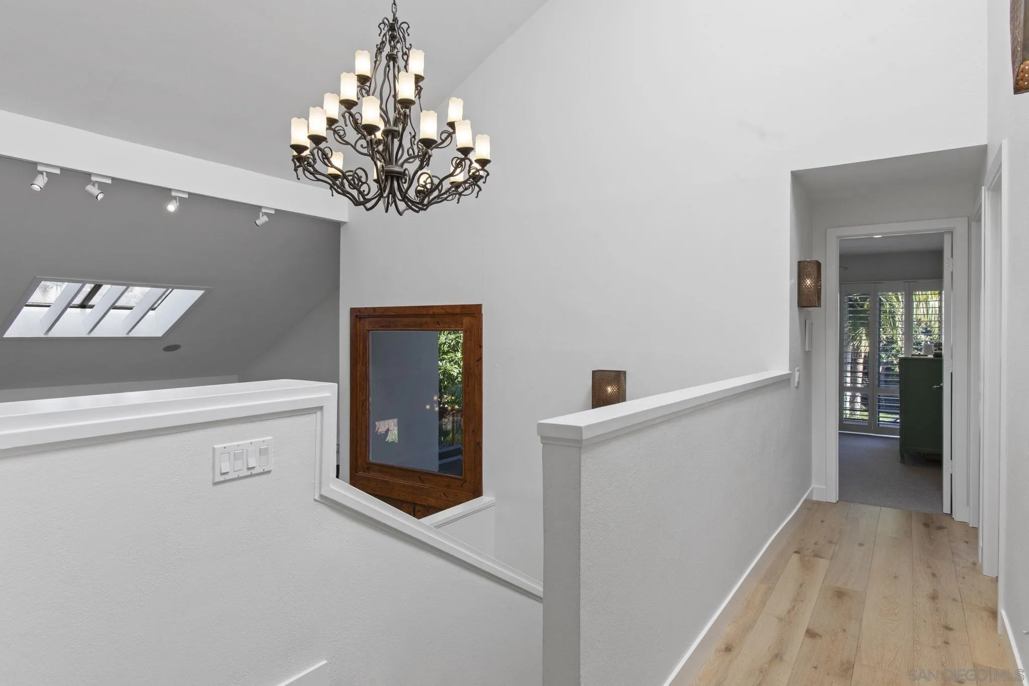 3942 Avenida Brisa Rancho Santa Fe, CA 92091 - Photo 33 of 47 a view of a hallway with chandelier and entryway