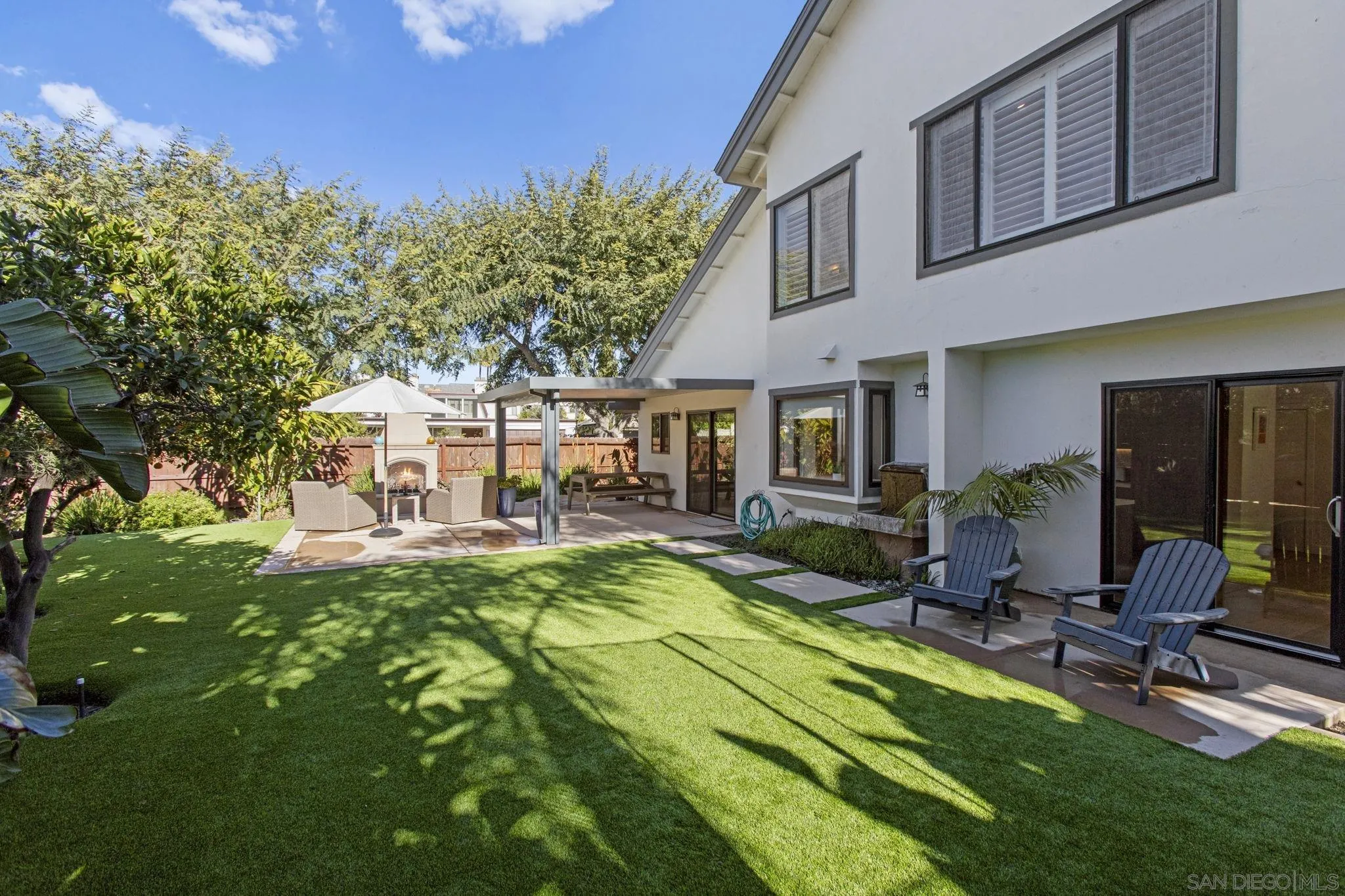 3942 Avenida Brisa Rancho Santa Fe, CA 92091 - Photo 42 of 47 a view of a house with backyard porch and sitting area