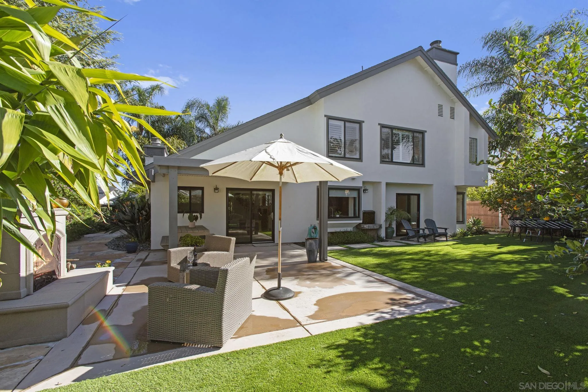 3942 Avenida Brisa Rancho Santa Fe, CA 92091 - Photo 44 of 47 a patio with a table and chairs and potted plants
