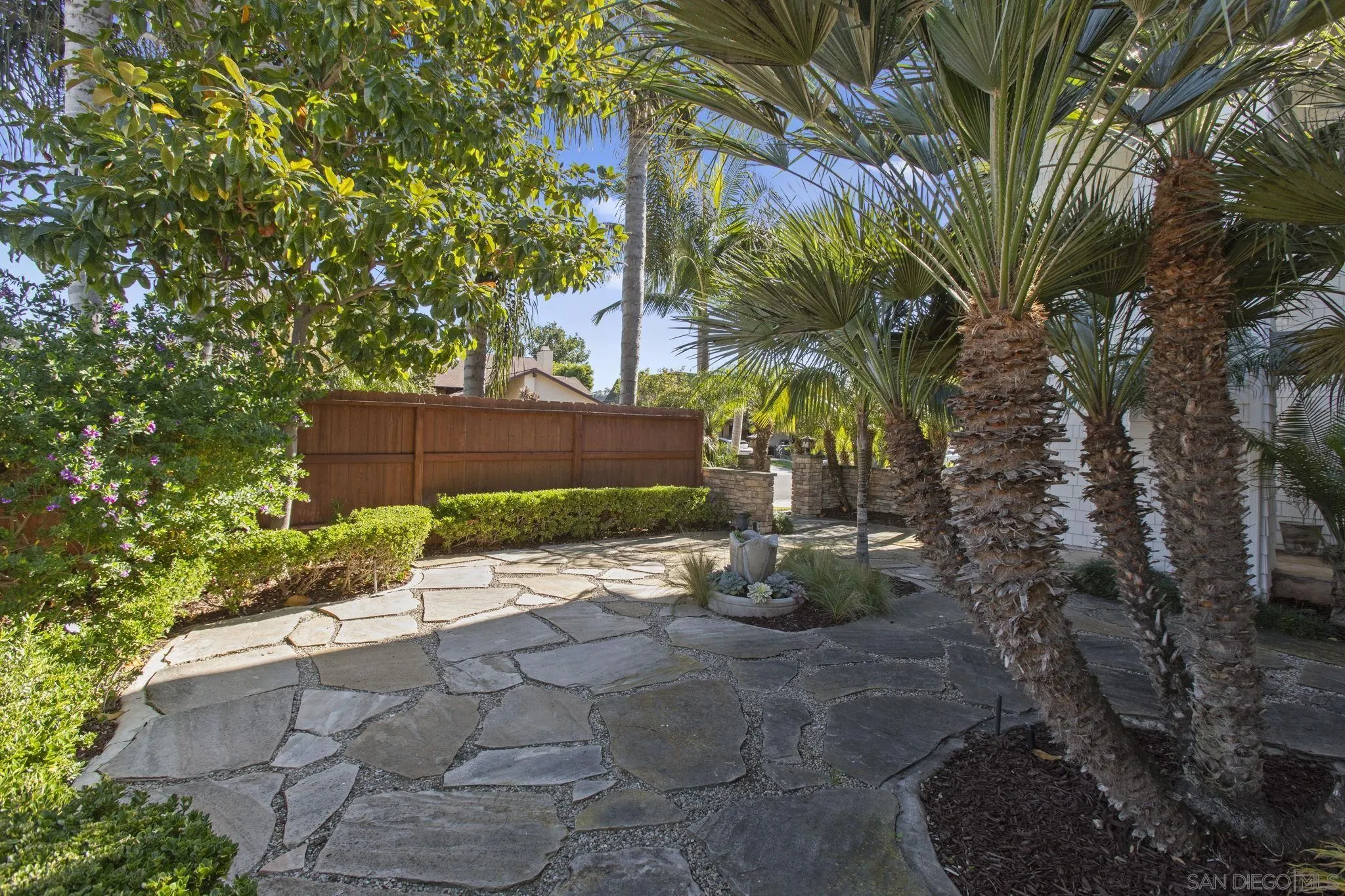 3942 Avenida Brisa Rancho Santa Fe, CA 92091 - Photo 7 of 47 a pathway of a house with a yard