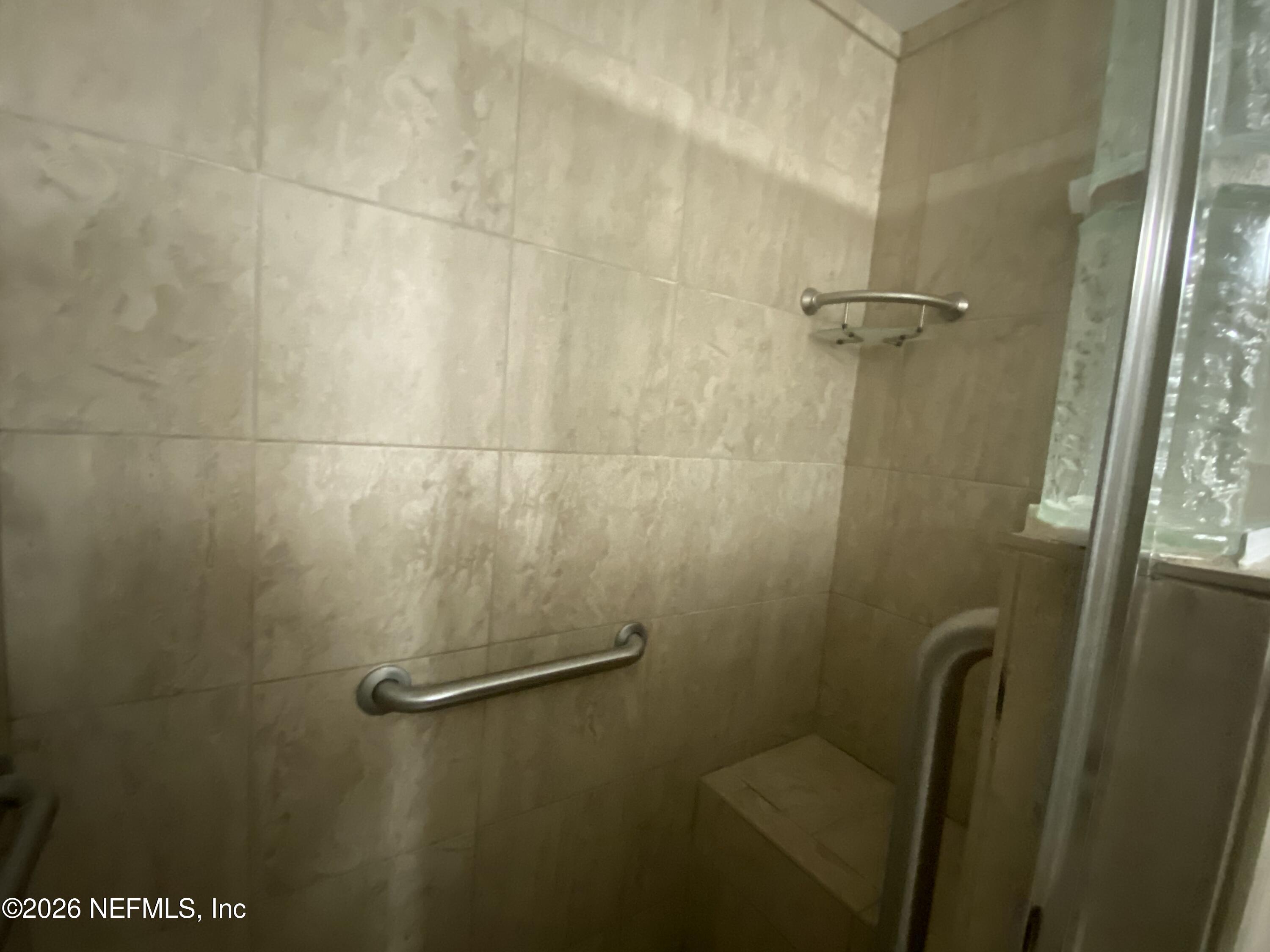 104 St Elmo Road Green Cove Springs, FL 32043 - Photo 15 of 24 a bathroom with a shower