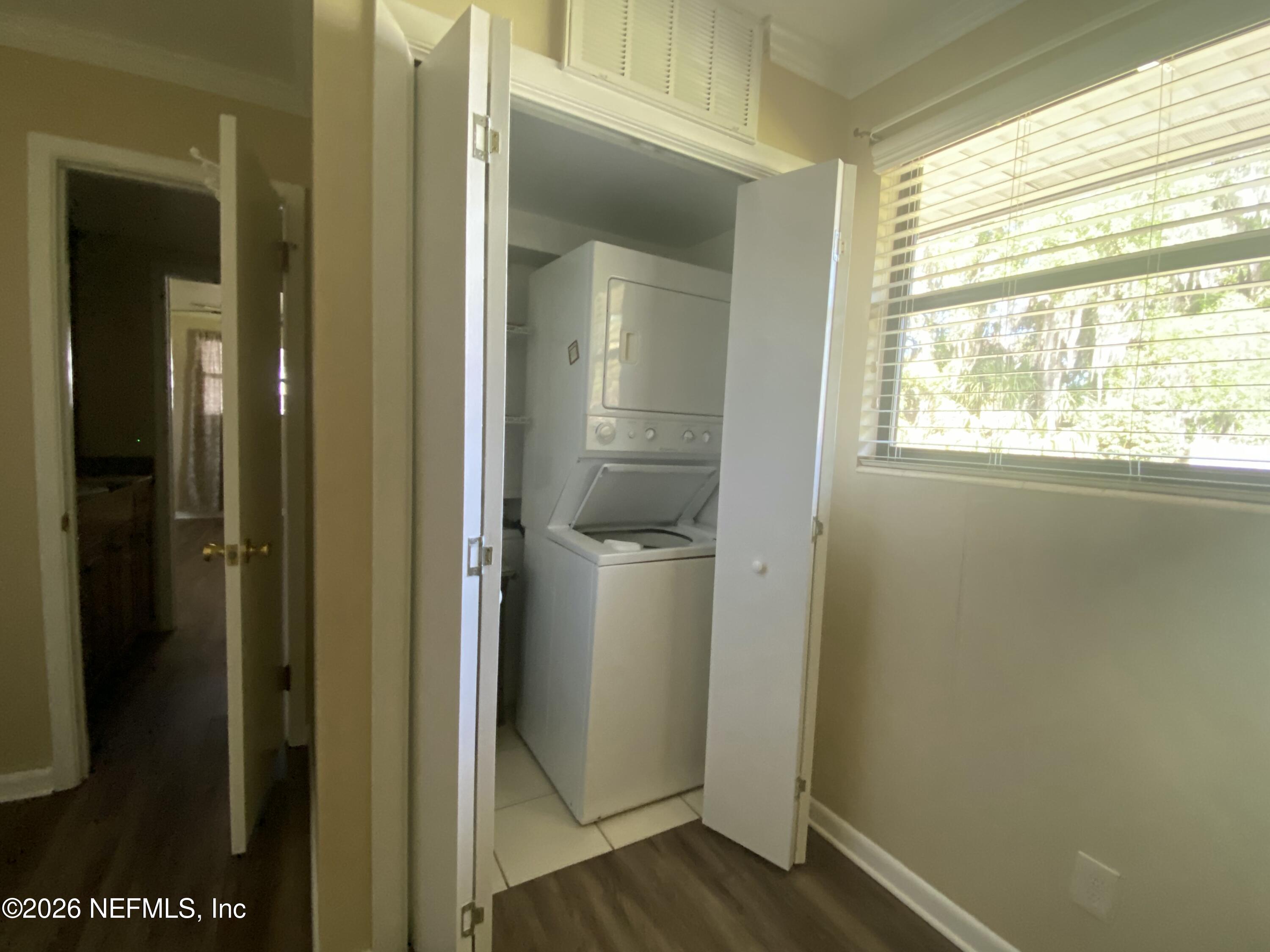 104 St Elmo Road Green Cove Springs, FL 32043 - Photo 17 of 24 a room with a door open to a room