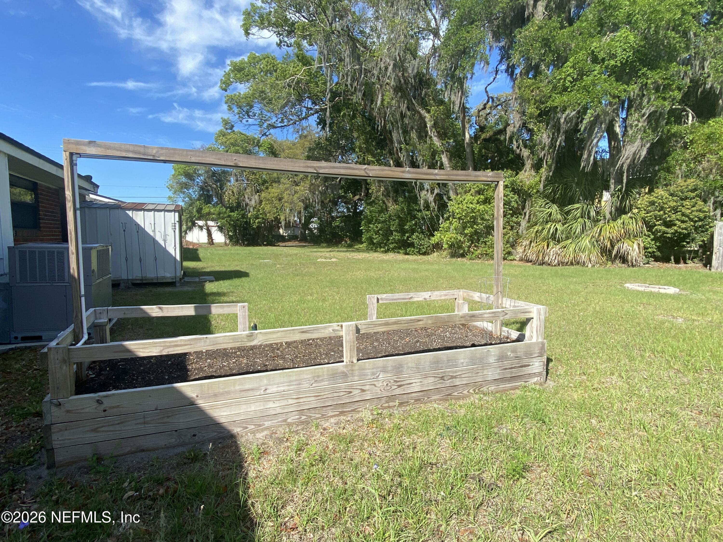 104 St Elmo Road Green Cove Springs, FL 32043 - Photo 23 of 24 a view of a backyard