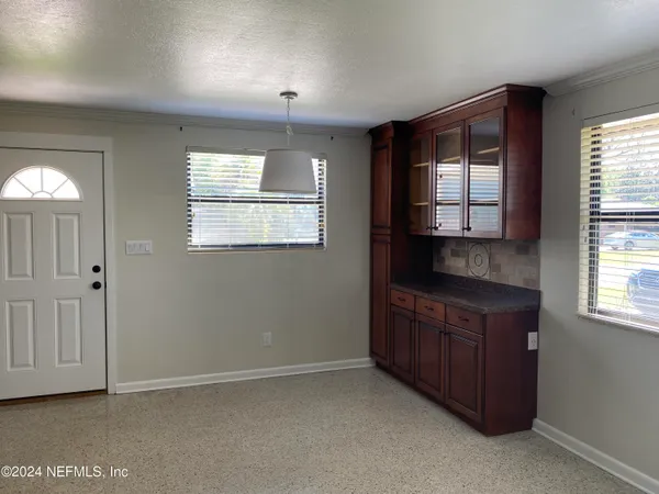 an empty room with windows