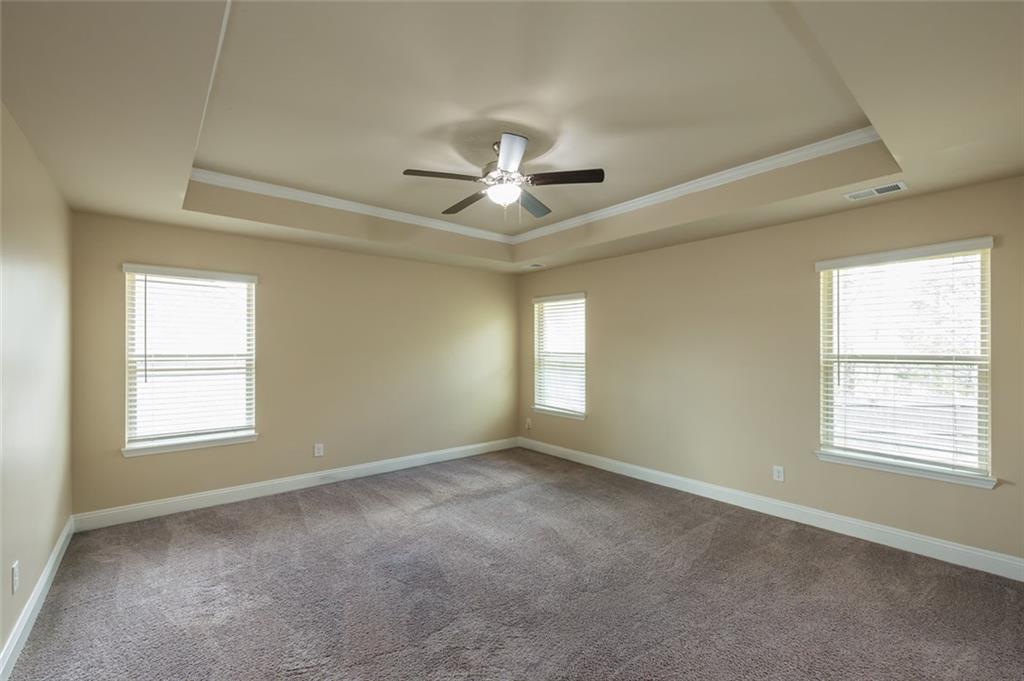 12172 Flannery Lane Hampton, GA 30228 - Photo 17 of 31 a view of an empty room with a window